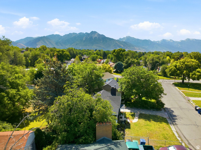 1187 East Ridgedale Circle Millcreek, UT 84106 - Photo 41 of 49 Expansive neighborhood with abundant mature trees and a prominent mountain range backdrop