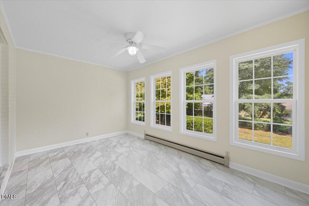 2604 Huntington Road Fayetteville, NC 28303 - Photo 16 of 48 a view of an empty room with a window