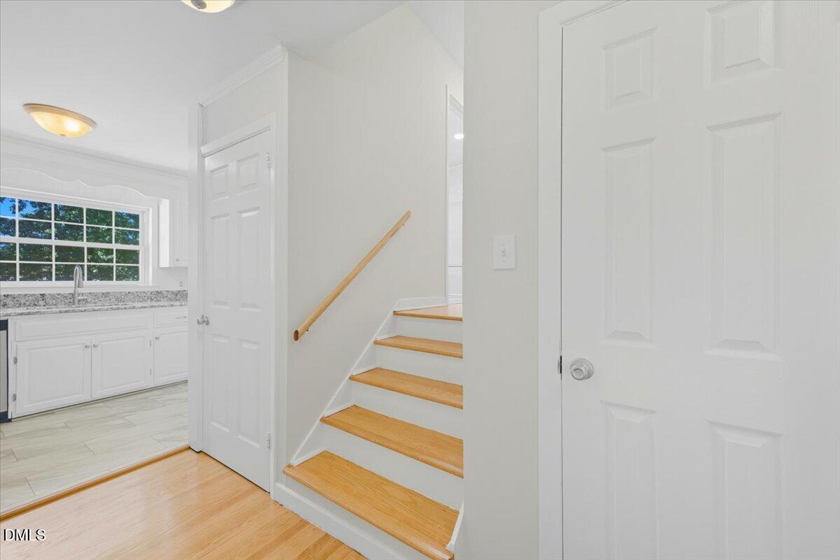2604 Huntington Road Fayetteville, NC 28303 - Photo 18 of 48 a view of entryway and hall with wooden floor