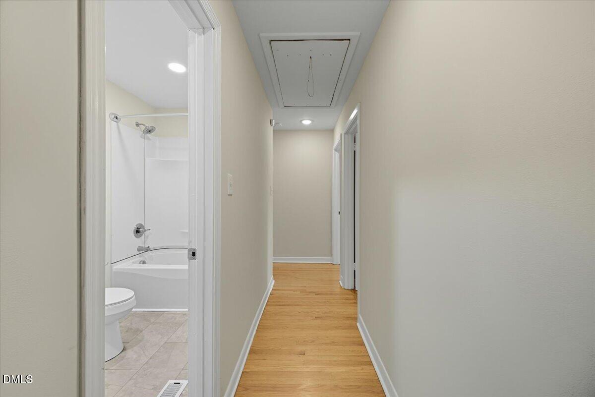 2604 Huntington Road Fayetteville, NC 28303 - Photo 19 of 48 a view of a bathroom from a hallway