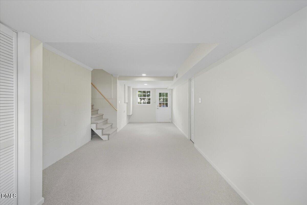 2604 Huntington Road Fayetteville, NC 28303 - Photo 30 of 48 a view of an empty room with a window