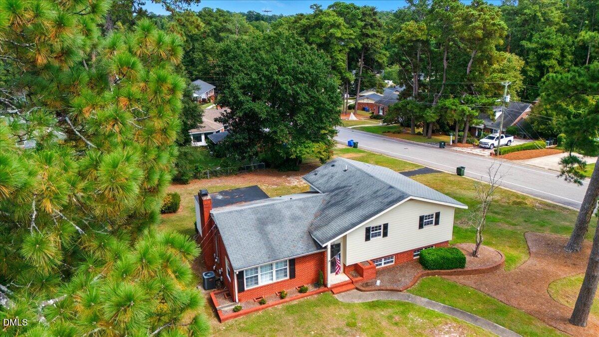 2604 Huntington Road Fayetteville, NC 28303 - Photo 41 of 48 an aerial view of a house having swimming pool patio and a yard
