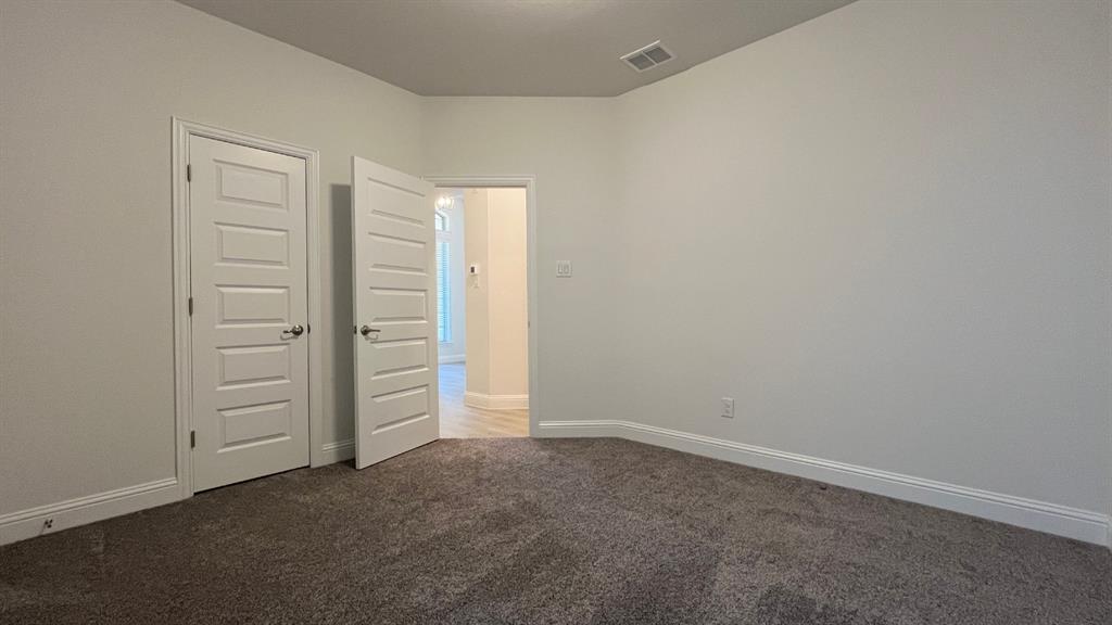 5304 Babcock Road McKinney, TX 75071 - Photo 17 of 27 an empty room with closet
