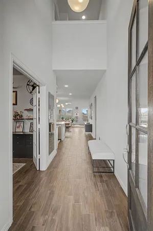 a view of a living room and a wooden floor