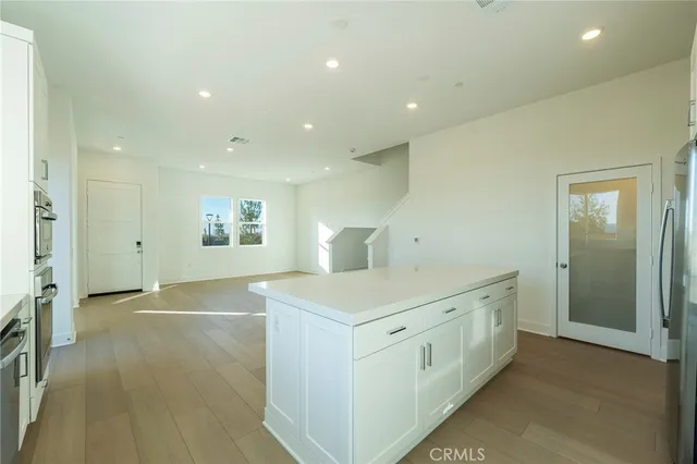 a view of a kitchen with a sink