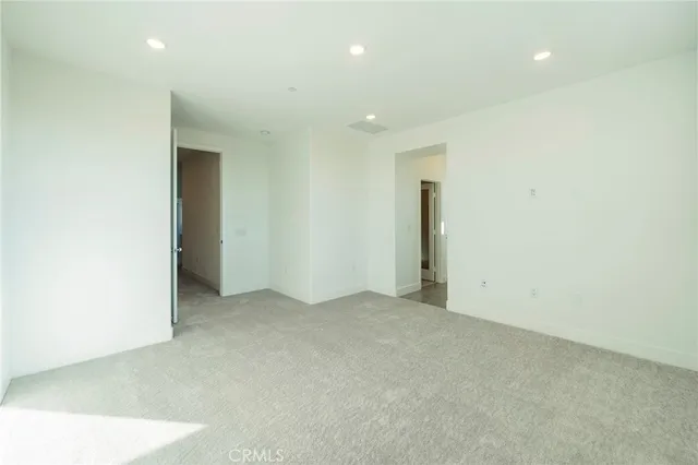 an empty room with an entryway