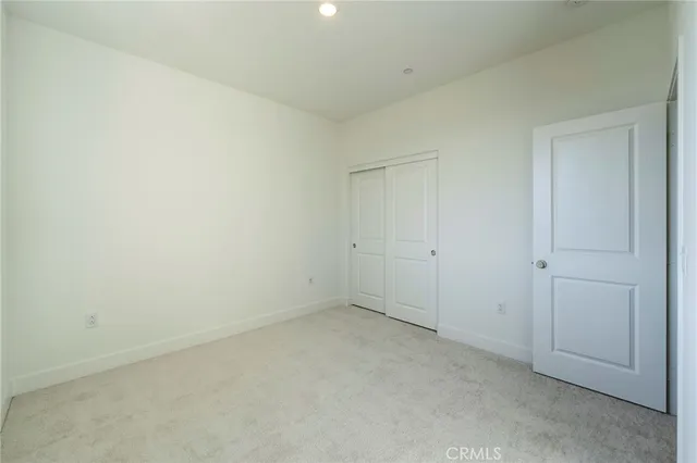 an empty room with an entryway