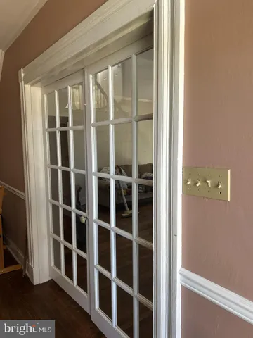 a view of empty room with windows