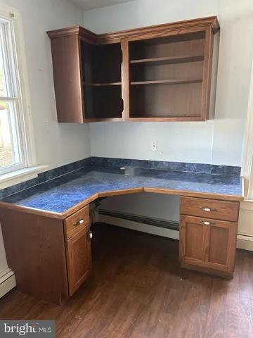 a view of storage and utility room with washer and dryer