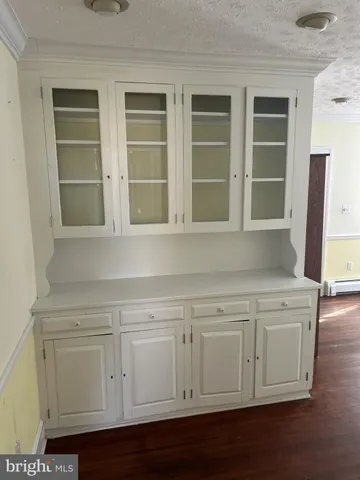 a view of cabinets and window