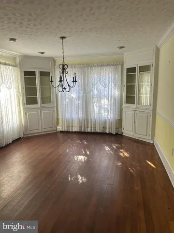 a view of a livingroom with furniture and window