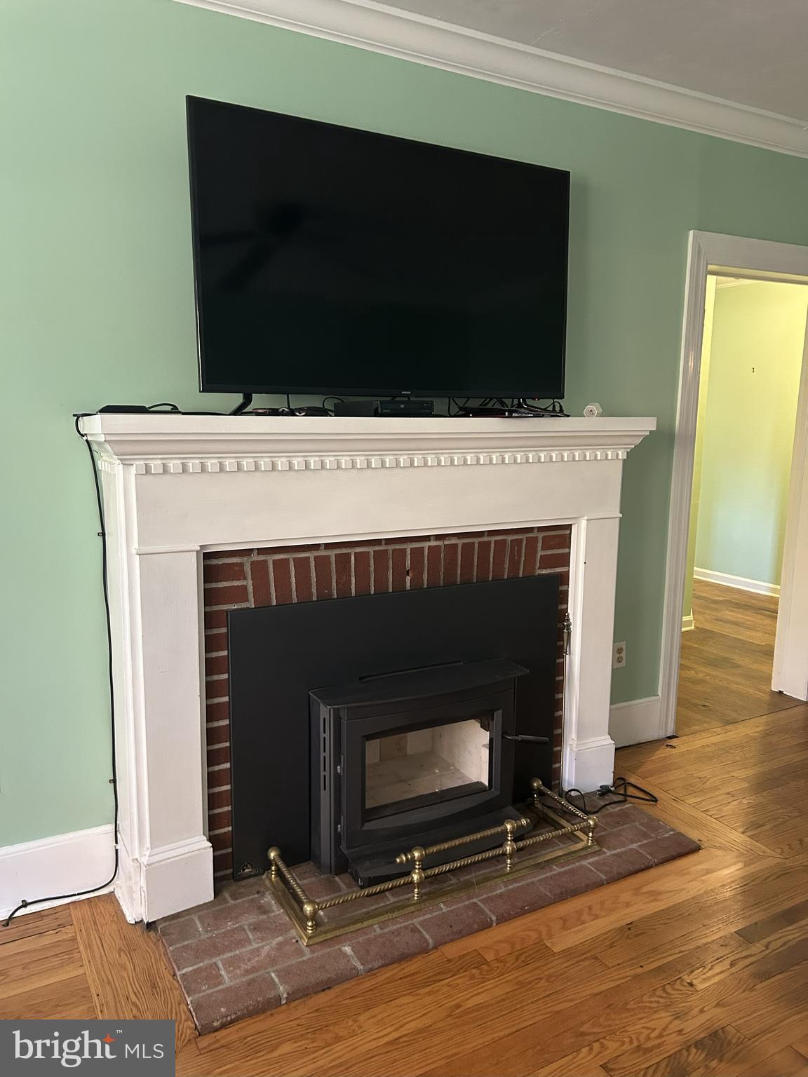 62 Rehill Avenue Elkton, MD 21921 - Photo 33 of 40 a living room with a fireplace a flat screen tv and a fireplace