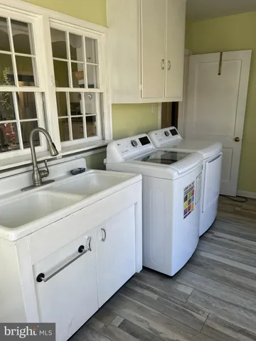 a utility room with washer and dryer