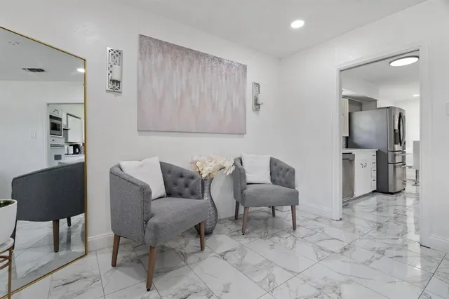 a living room with furniture and a couch