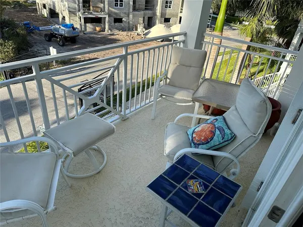 a bathroom with a tub sink toilet and shower