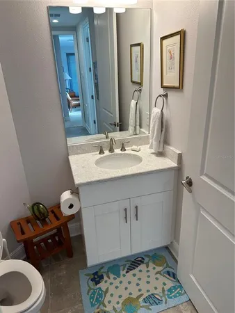 a view of a house with swimming pool and furniture