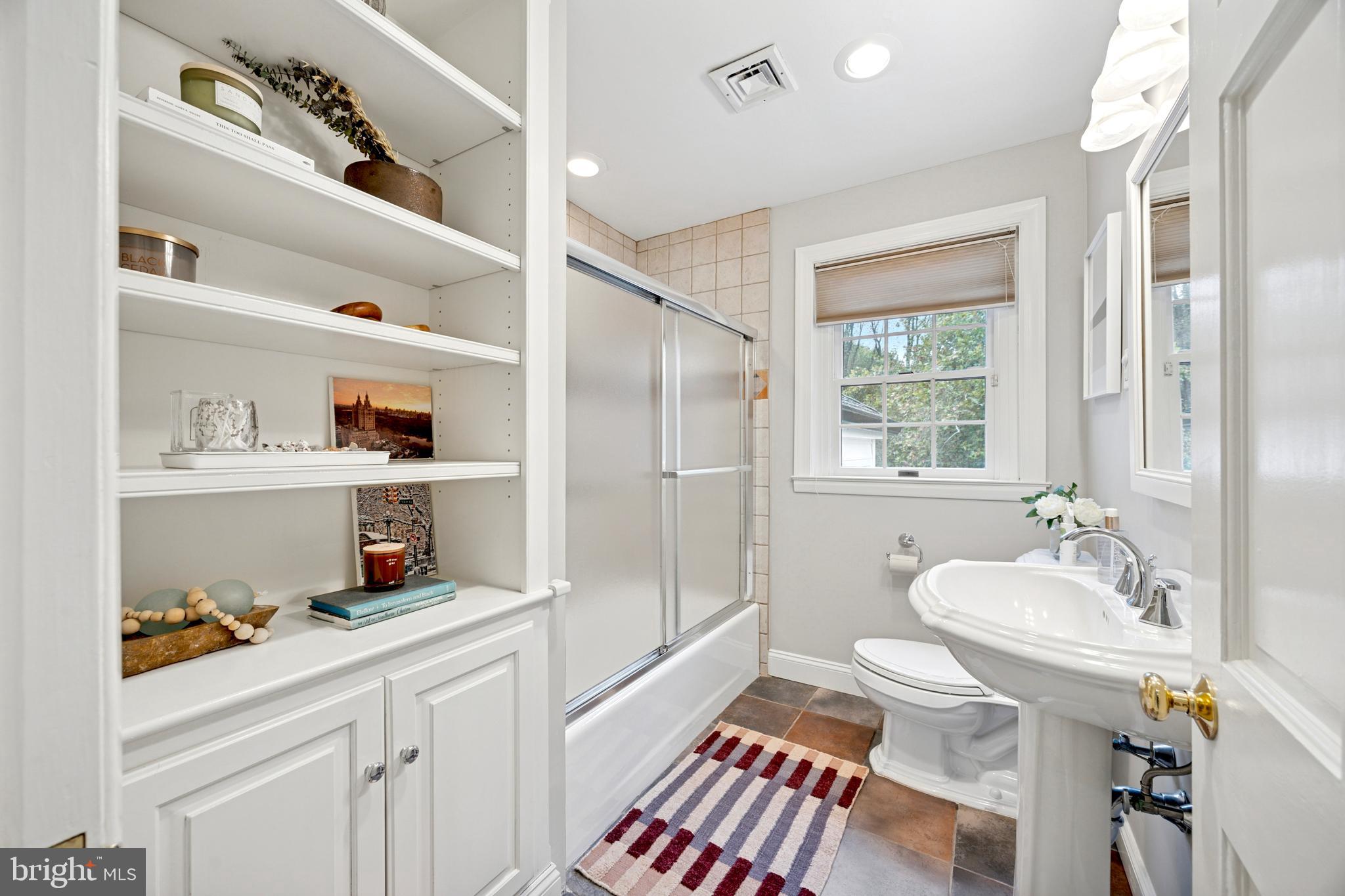 1726 Riverview Road Gladwyne, PA 19035 - Photo 26 of 38 a bathroom with a sink a toilet and a shower