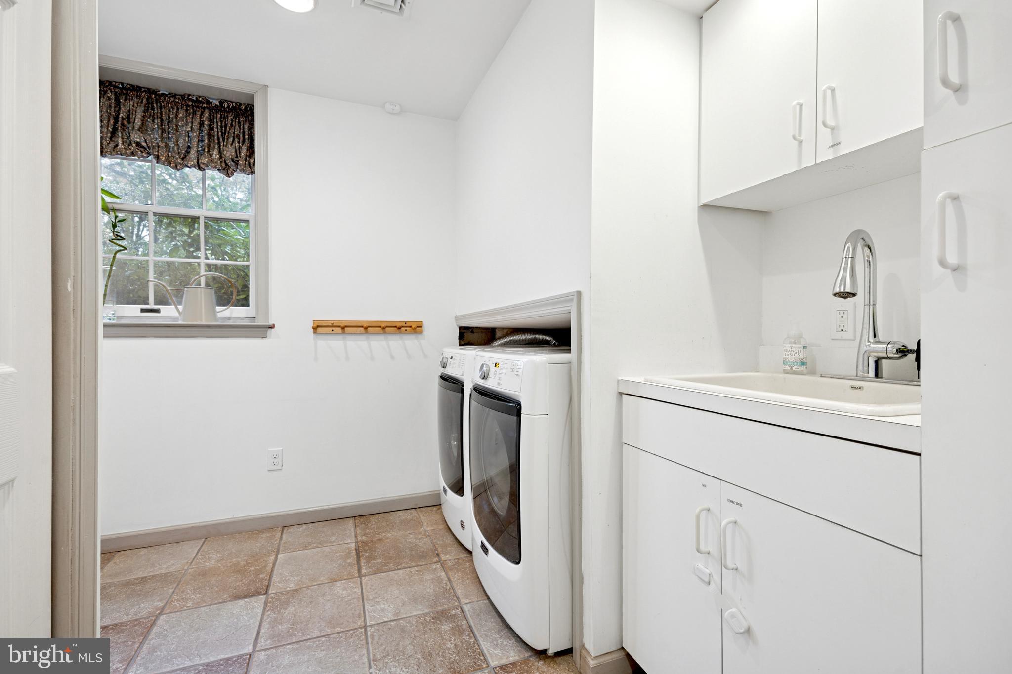 1726 Riverview Road Gladwyne, PA 19035 - Photo 30 of 38 a utility room with dryer and washer