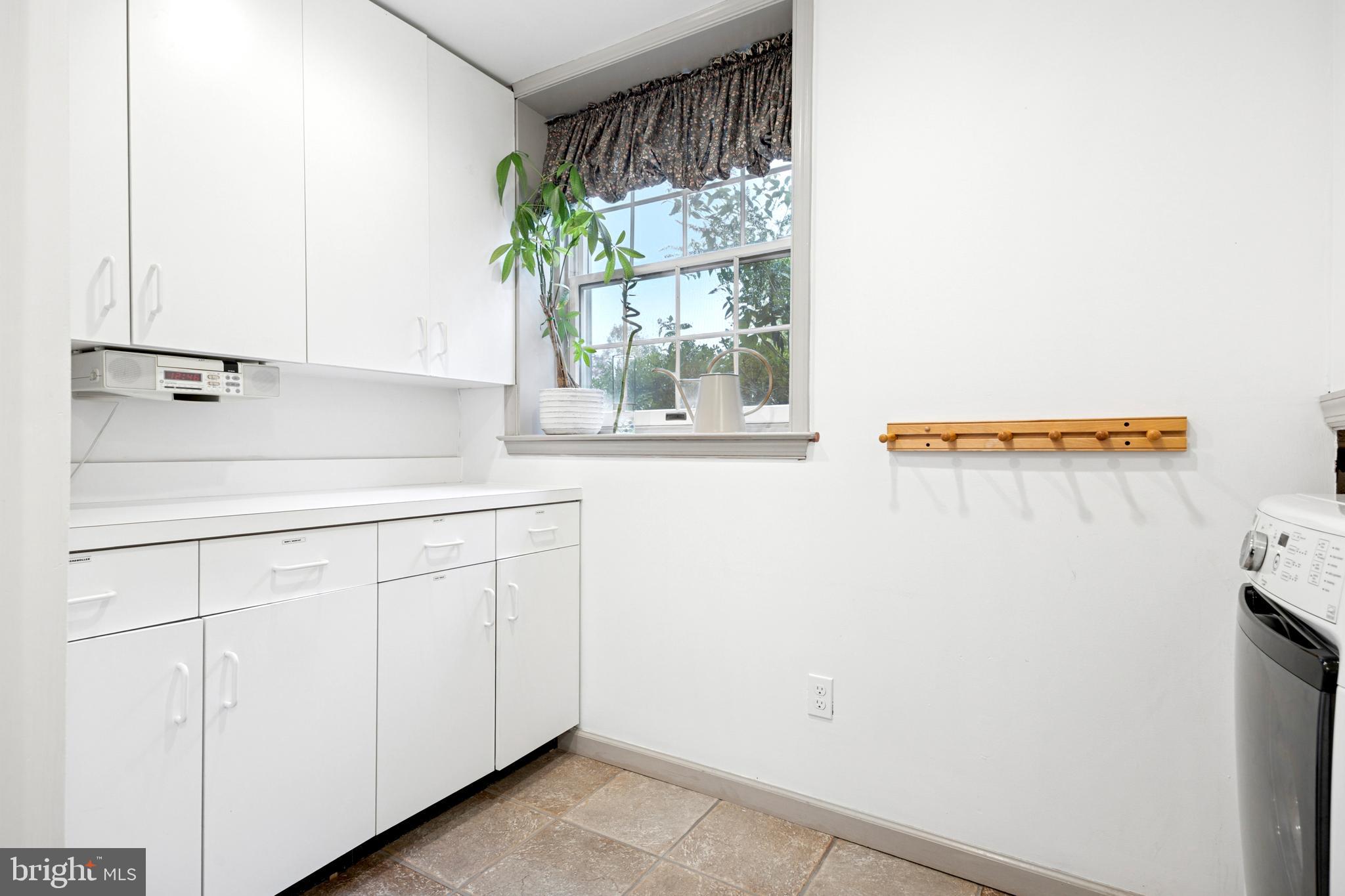 1726 Riverview Road Gladwyne, PA 19035 - Photo 31 of 38 a kitchen with a sink and a window