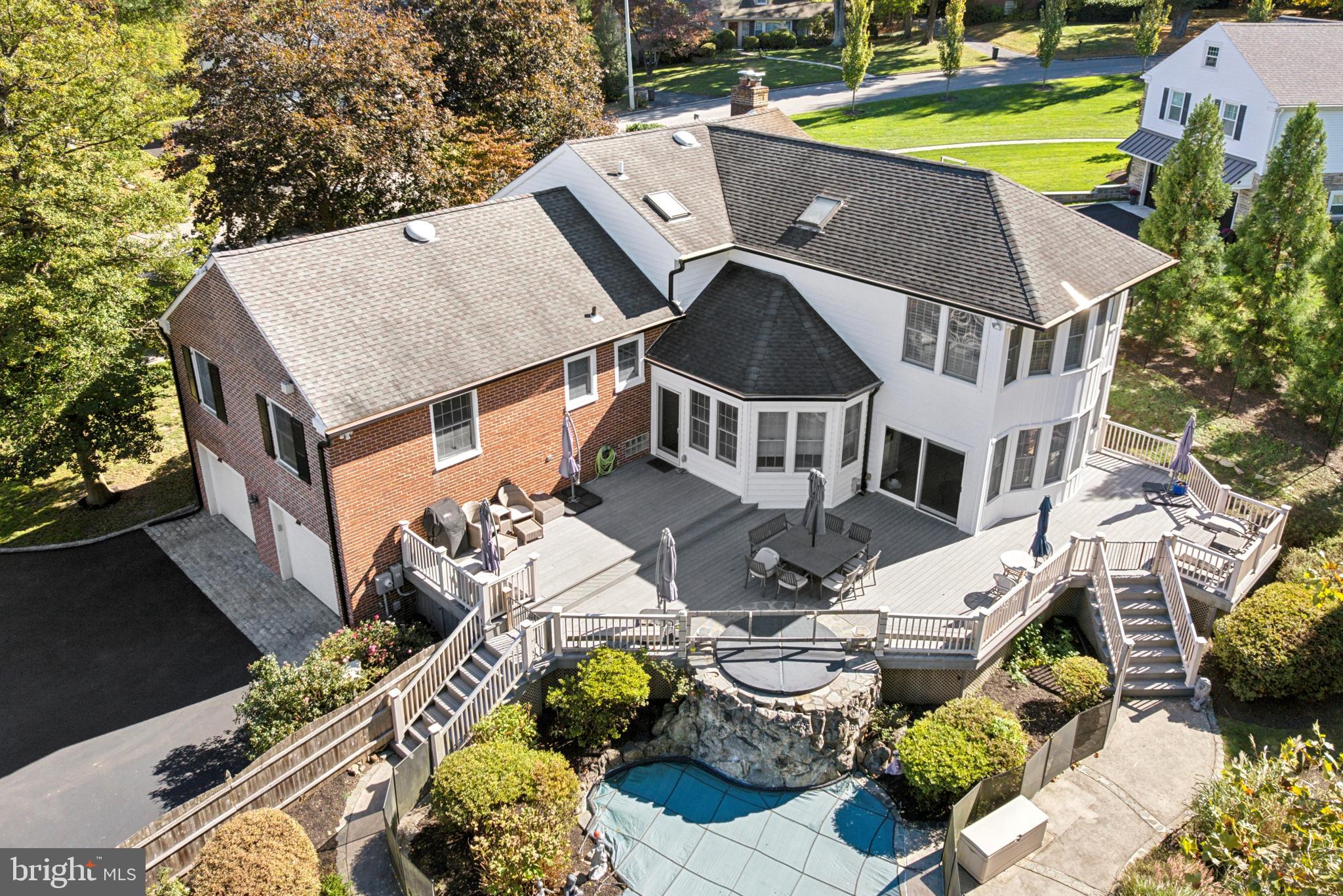 1726 Riverview Road Gladwyne, PA 19035 - Photo 36 of 38 a aerial view of a house with swimming pool and patio