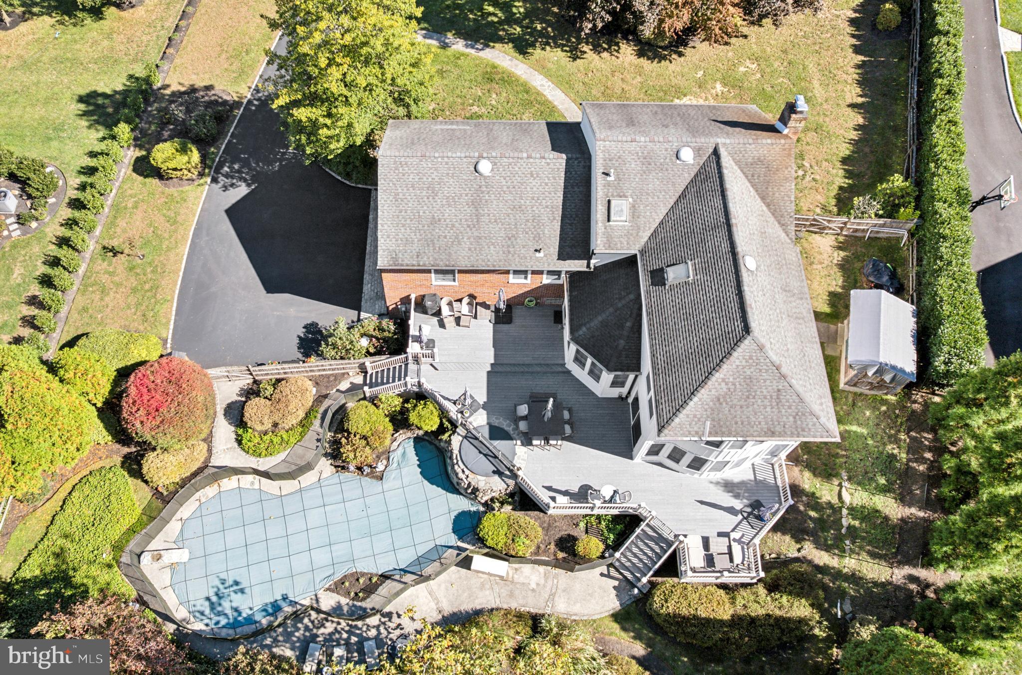 1726 Riverview Road Gladwyne, PA 19035 - Photo 37 of 38 an aerial view of a house with swimming pool