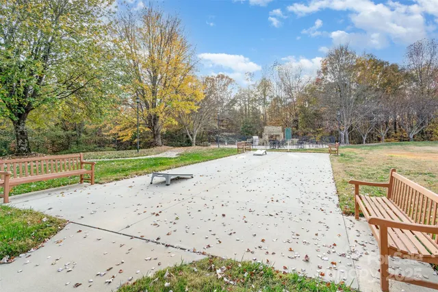 a view of a lake with a yard
