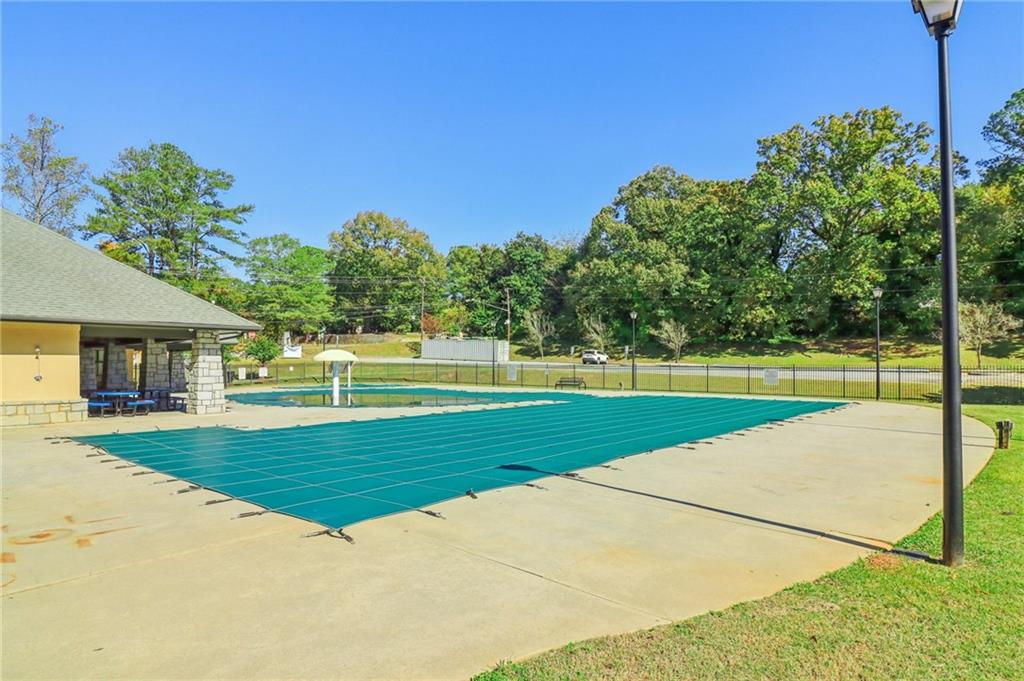 957 Texel Lane Clarkston, GA 30021 - Photo 21 of 27 a view of a house with a big yard