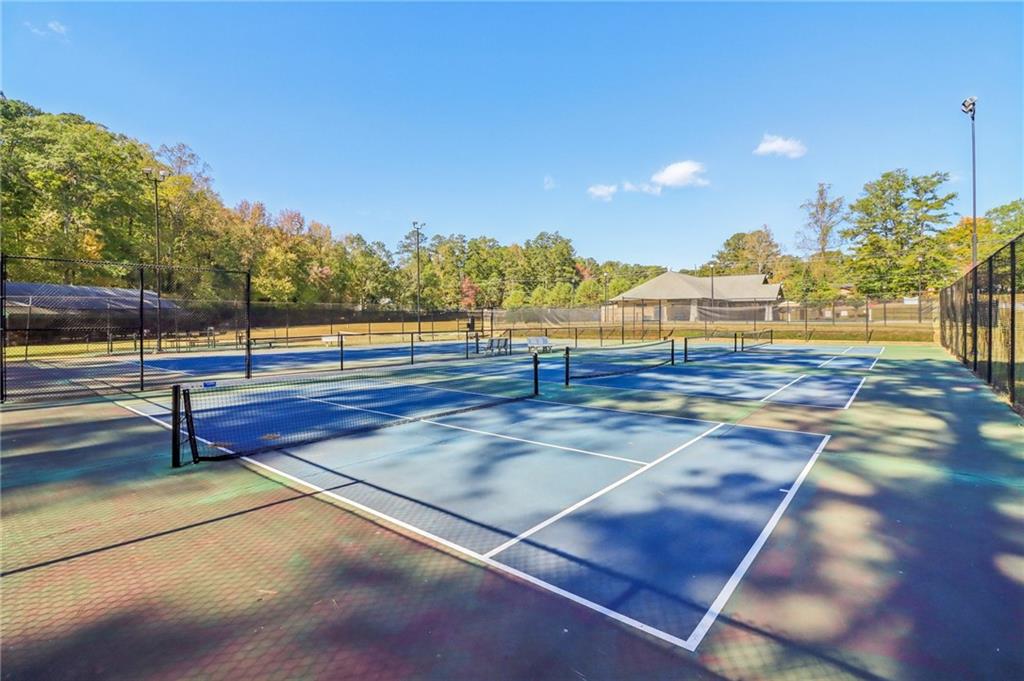 957 Texel Lane Clarkston, GA 30021 - Photo 22 of 27 a view of an outdoor space and tennis court