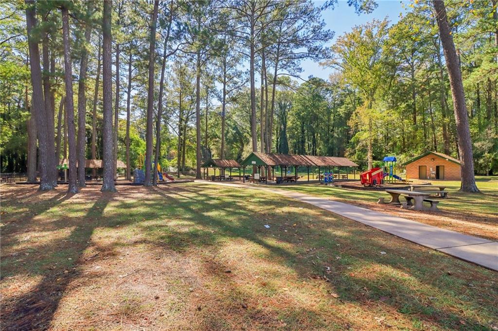957 Texel Lane Clarkston, GA 30021 - Photo 23 of 27 a view of outdoor space with garden and trees