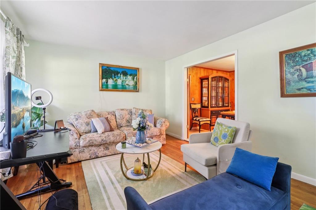 957 Texel Lane Clarkston, GA 30021 - Photo 3 of 27 a living room with furniture and wooden floor