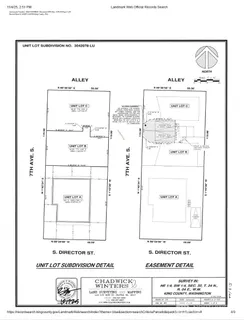 an aerial view of a houses with yard