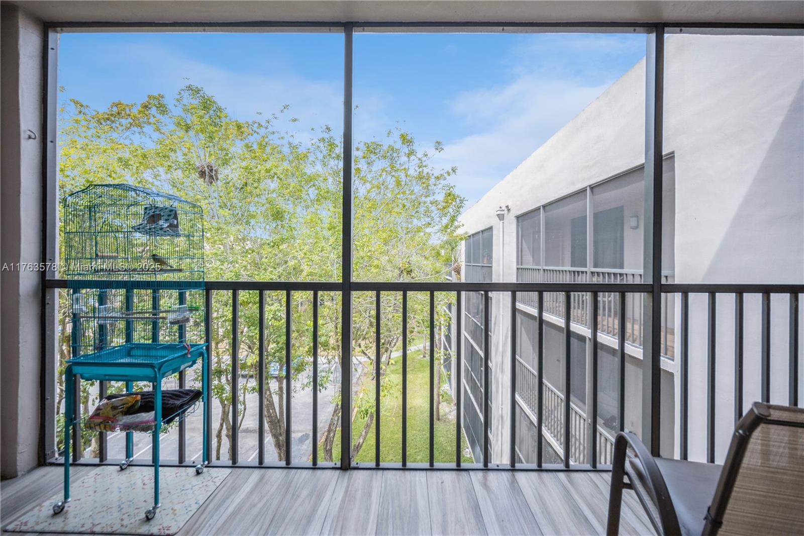 8500 Southwest 133rd Avenue Road, Unit 415 Miami, FL 33183 - Photo 14 of 27 Balcony view from living area