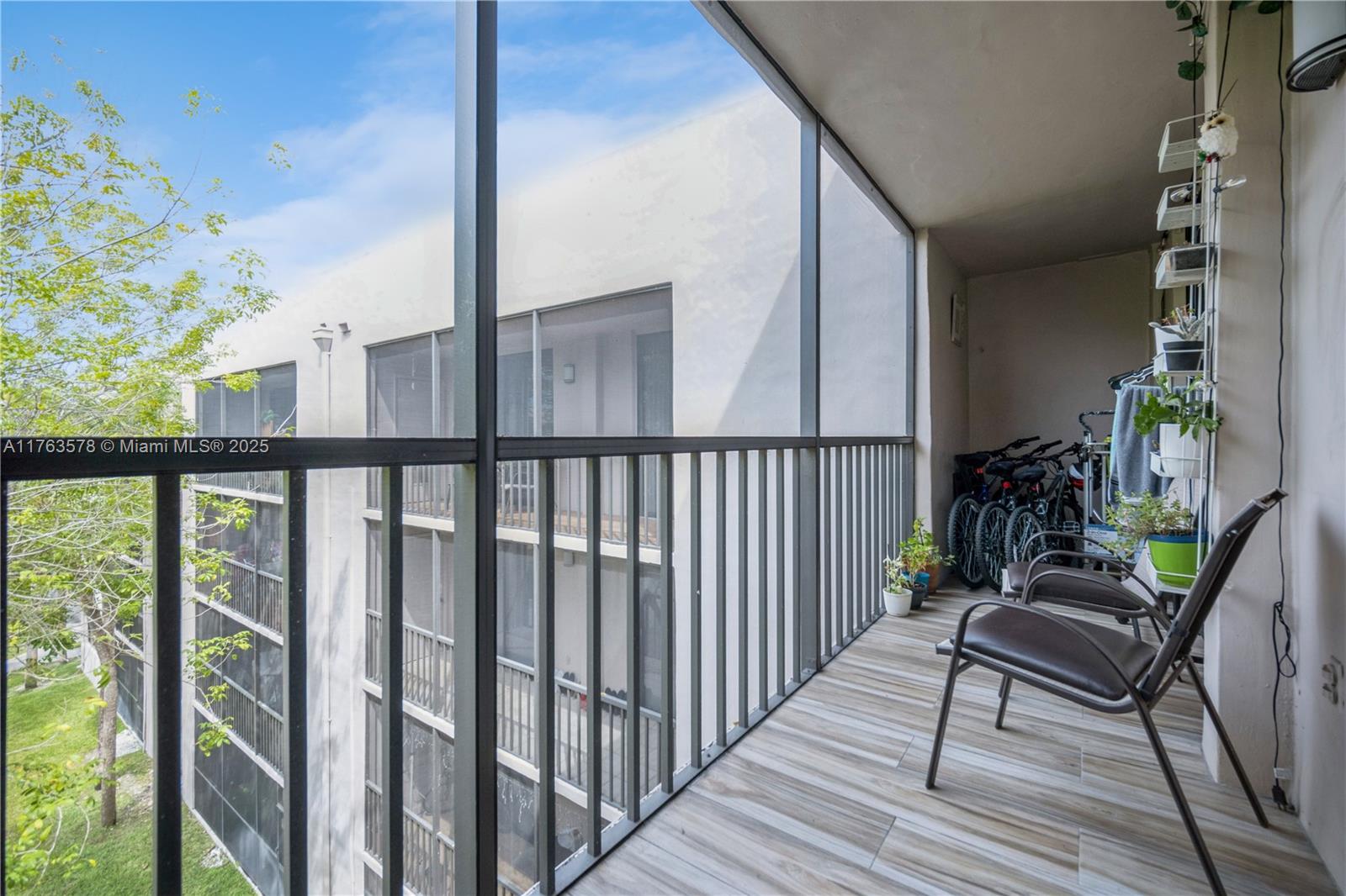 8500 Southwest 133rd Avenue Road, Unit 415 Miami, FL 33183 - Photo 15 of 27 Screen Balcony