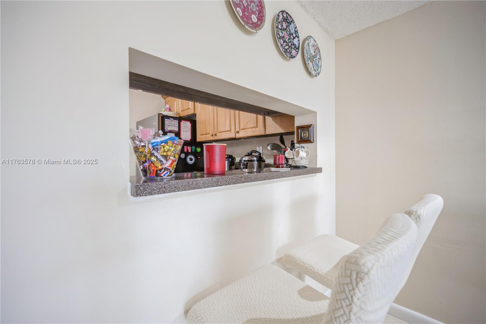 8500 Southwest 133rd Avenue Road, Unit 415 Miami, FL 33183 - Photo 9 of 27 Opening from Kicthen to Dinning Area