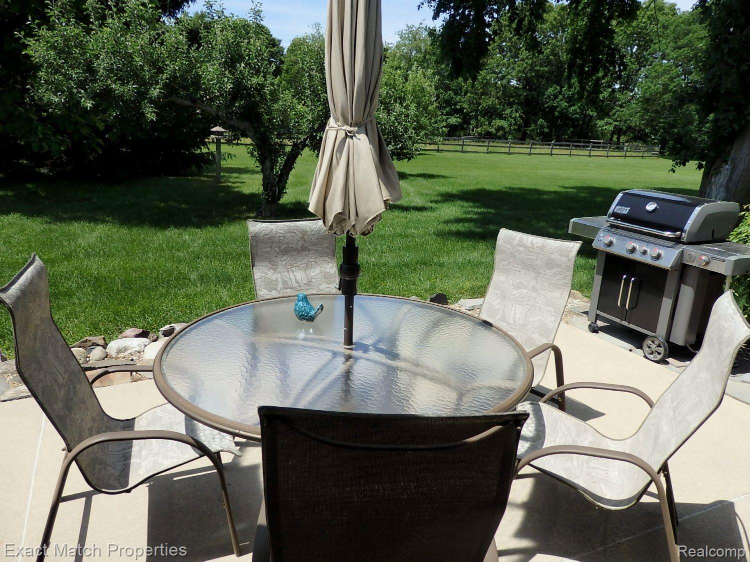 2980 East Rose Center Road Highland, MI 48356 - Photo 15 of 72 Relax on the patio and enjoy the views!