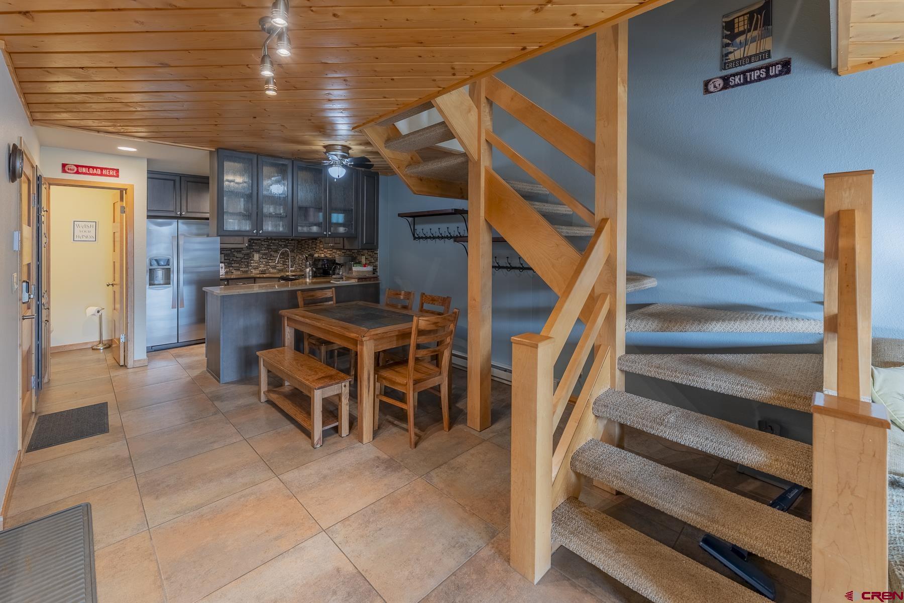 11 Morning Glory Way, Unit 14 Crested Butte, CO 81225 - Photo 15 of 44 a view of a patio with table and chairs