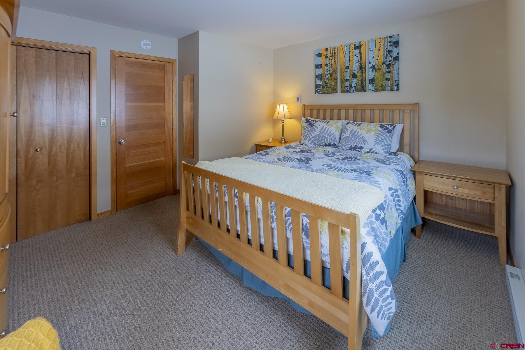 11 Morning Glory Way, Unit 14 Crested Butte, CO 81225 - Photo 29 of 44 a bedroom with a bed and a window