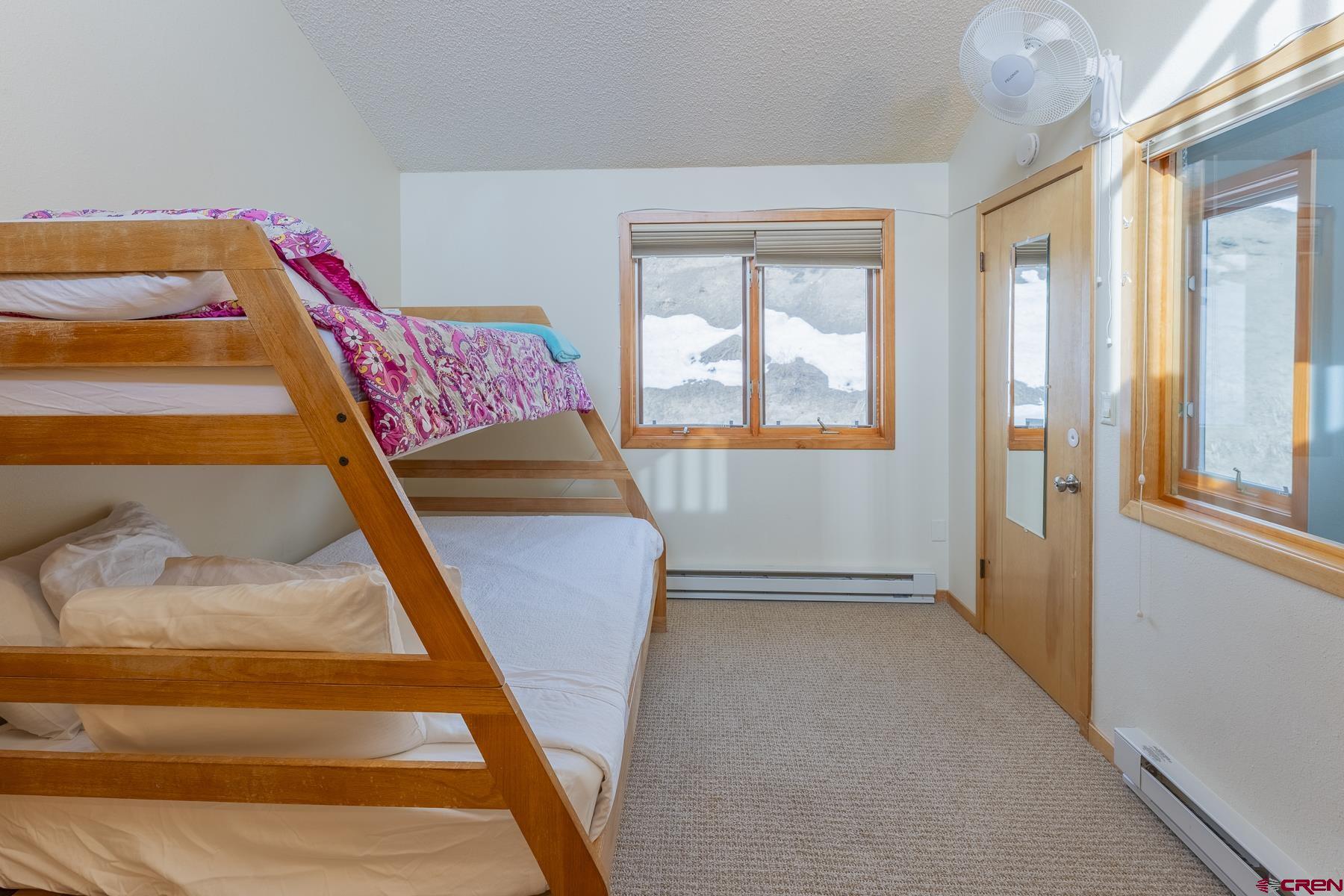 11 Morning Glory Way, Unit 14 Crested Butte, CO 81225 - Photo 32 of 44 a view of an entryway with staircase
