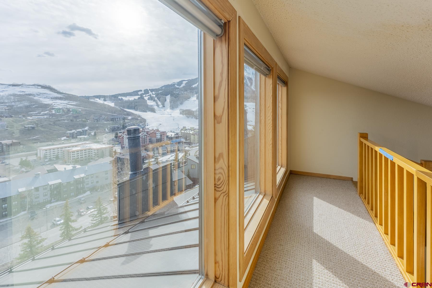11 Morning Glory Way, Unit 14 Crested Butte, CO 81225 - Photo 35 of 44 a view of a city from a corridor