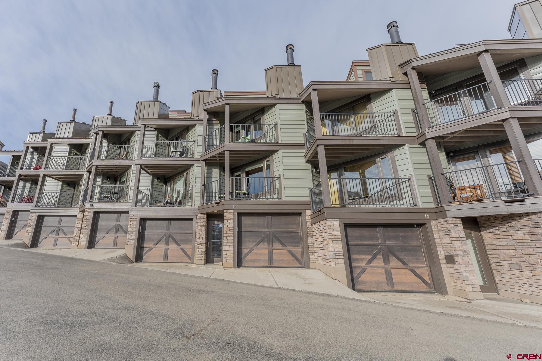 11 Morning Glory Way, Unit 14 Crested Butte, CO 81225 - Photo 7 of 44 a view of roof deck with table and chairs