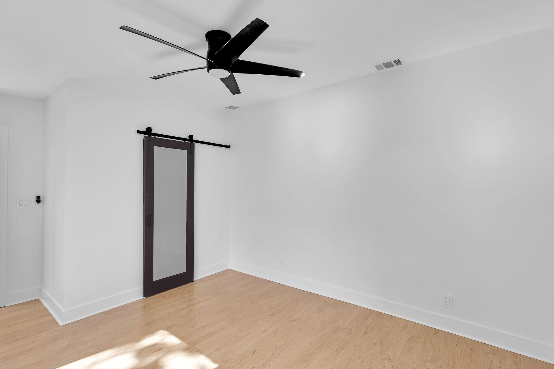 a view of a big room with carpet