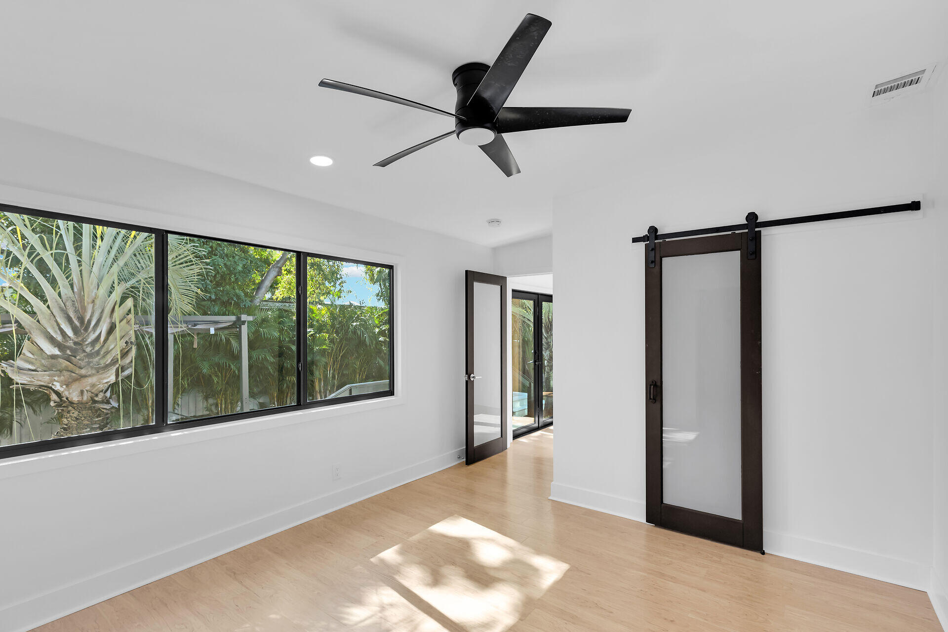 2800 Staples Avenue Key West, FL 33040 - Photo 15 of 42 a view of empty room with wooden floor and fan