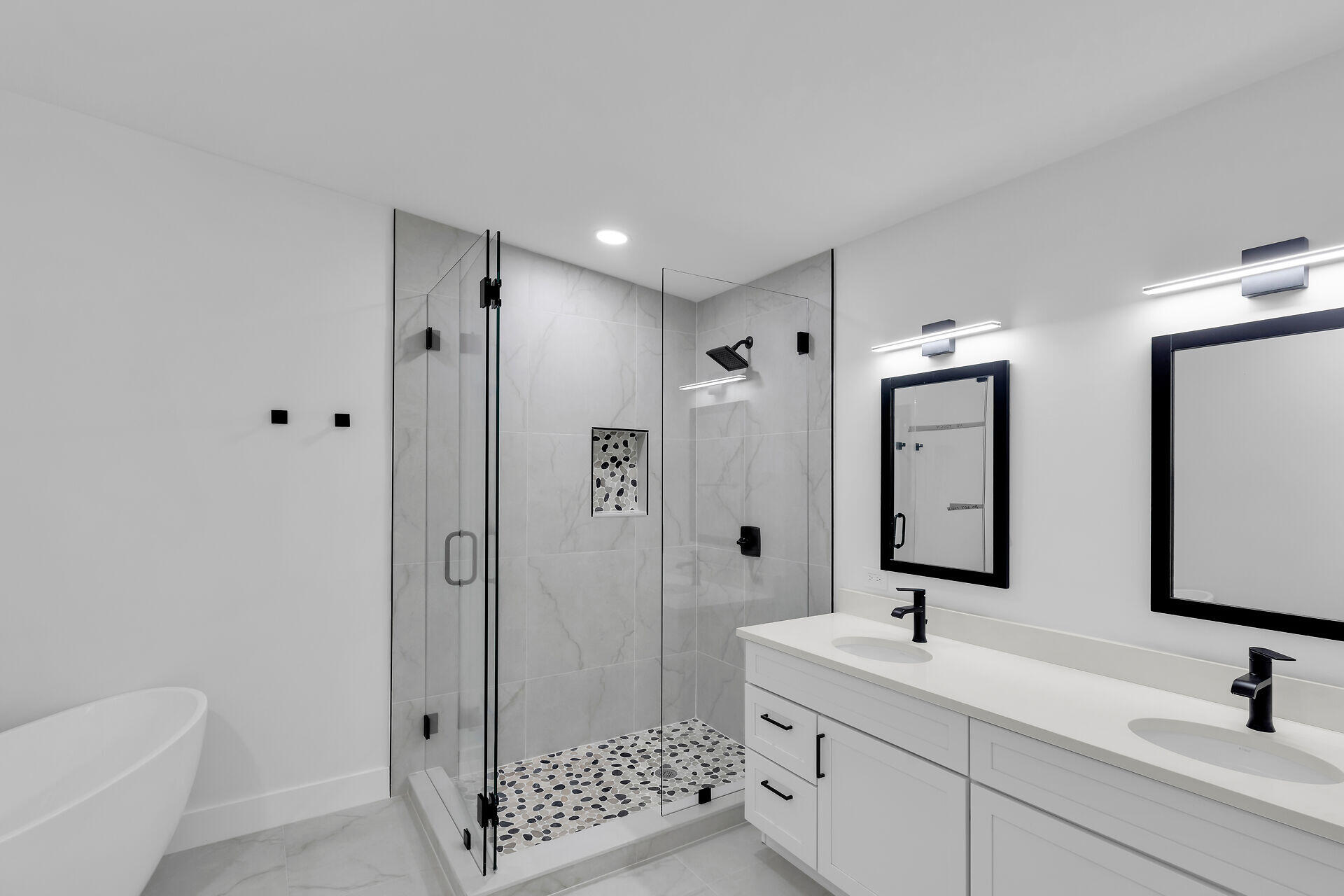 2800 Staples Avenue Key West, FL 33040 - Photo 18 of 42 a bathroom with a double vanity sink mirror double and shower