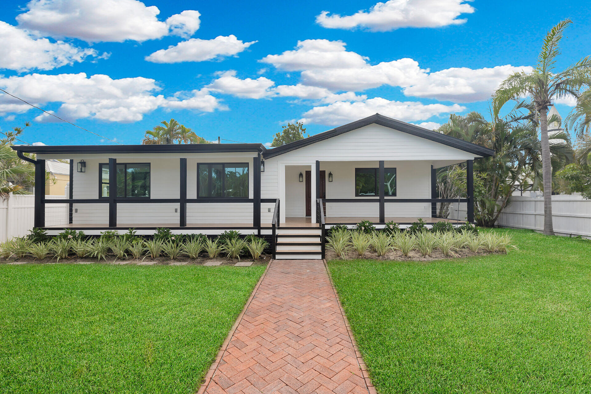 2800 Staples Avenue Key West, FL 33040 - Photo 23 of 42 a front view of a house with a garden and plants