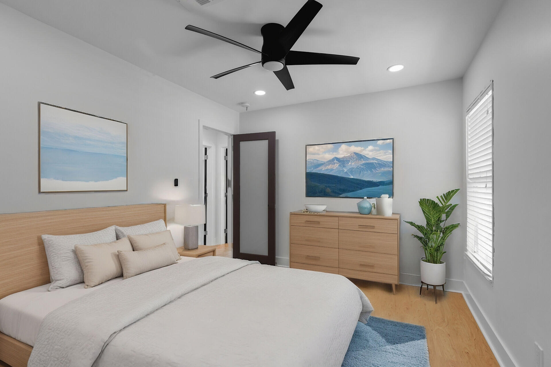 2800 Staples Avenue Key West, FL 33040 - Photo 35 of 42 a bedroom with a bed and a painting on the wall