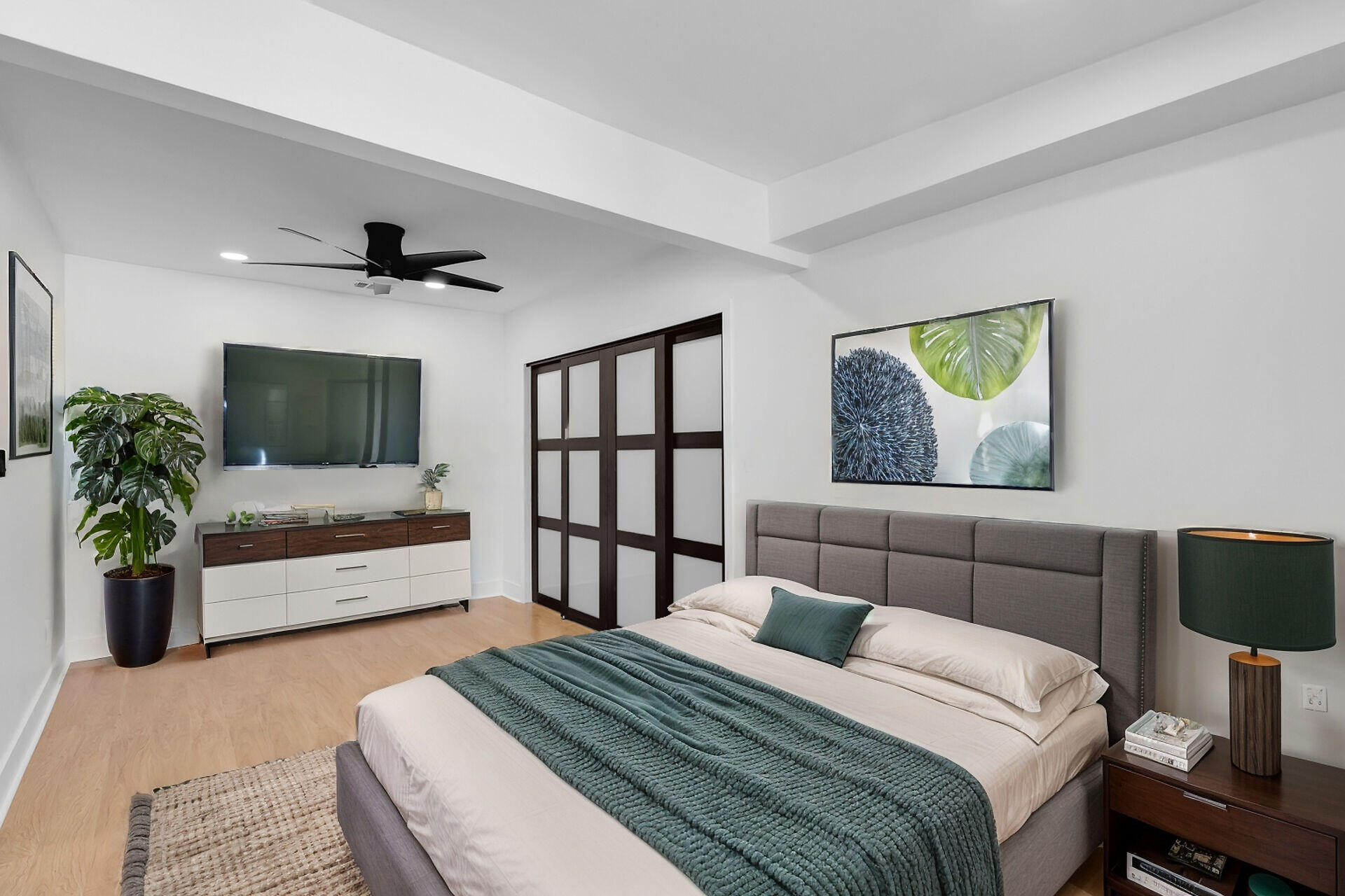 2800 Staples Avenue Key West, FL 33040 - Photo 39 of 42 a bedroom with a large bed and a flat screen tv
