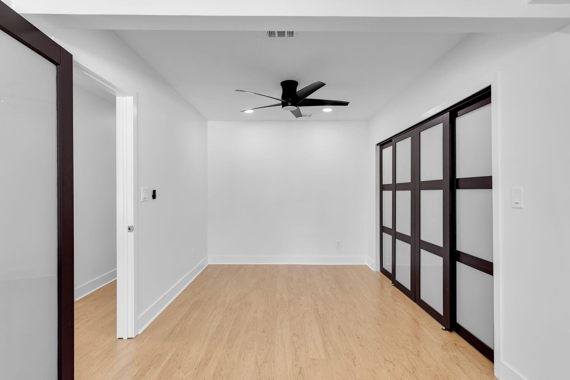 2800 Staples Avenue Key West, FL 33040 - Photo 4 of 42 a view of empty room with a window and a ceiling fan