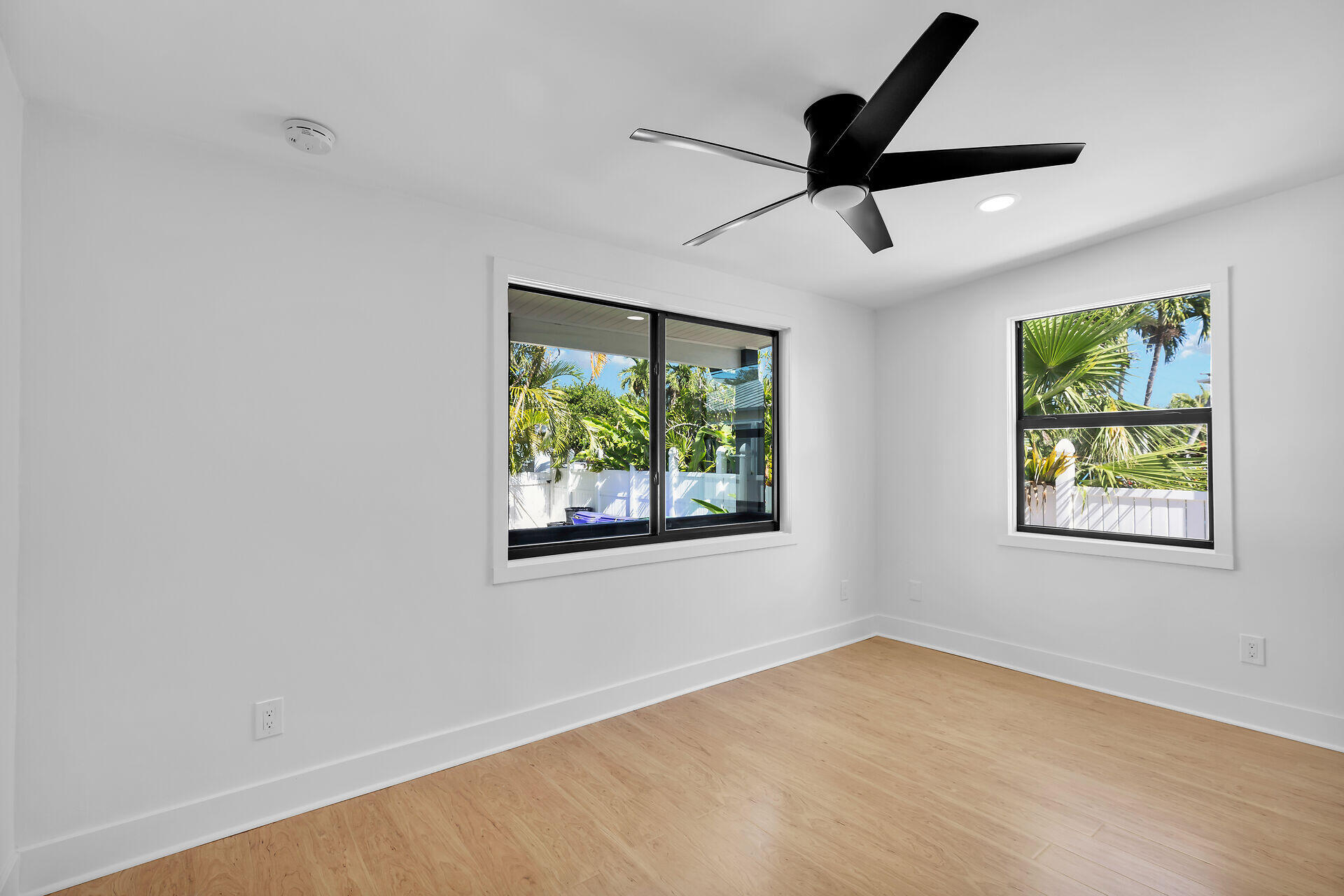 2800 Staples Avenue Key West, FL 33040 - Photo 40 of 42 an empty room with window and ceiling fan