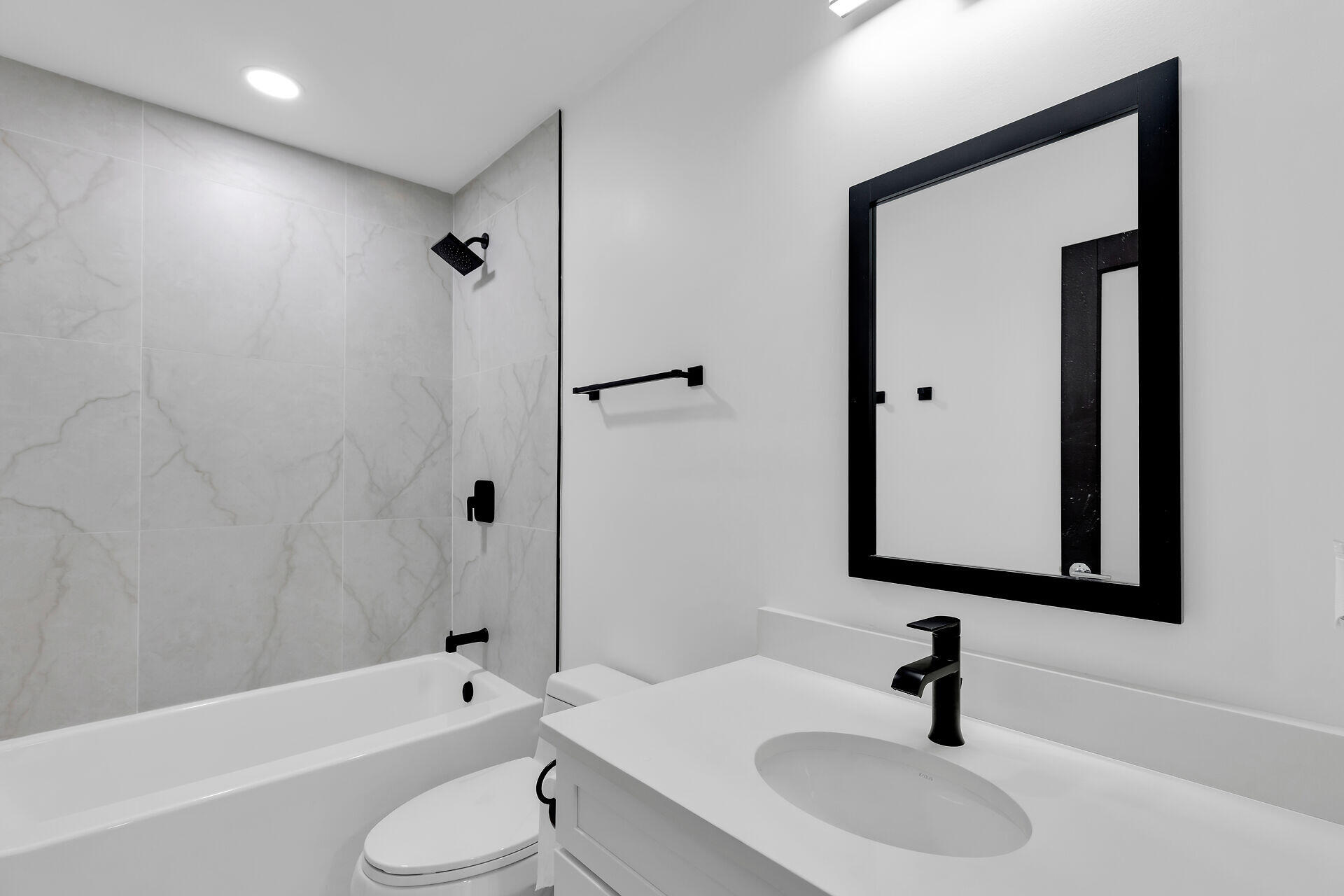 2800 Staples Avenue Key West, FL 33040 - Photo 5 of 42 a bathroom with a sink a toilet and a bathtub