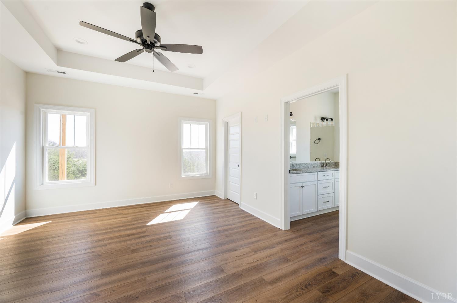 10578 Leesville Road Lynch Station, VA 24571 - Photo 19 of 54 a view of a room with wooden floor and windows